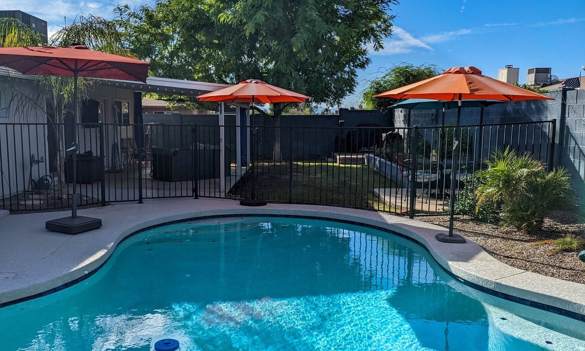 Westgreen Estates House | An oasis featuring a pool, where quiet luxury meets backyard tranquility.