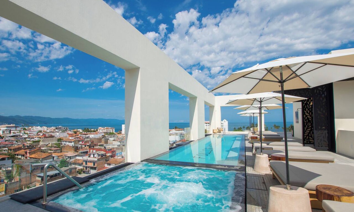 Colonia 5 de Diciembre Condo | Blissful Ocean-View Penthouse with Rooftop Pool