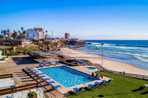 La Paloma House | Bright Dog-Friendly Home with Heated Pool, Hot Tub, Streaming, & Ocean Views