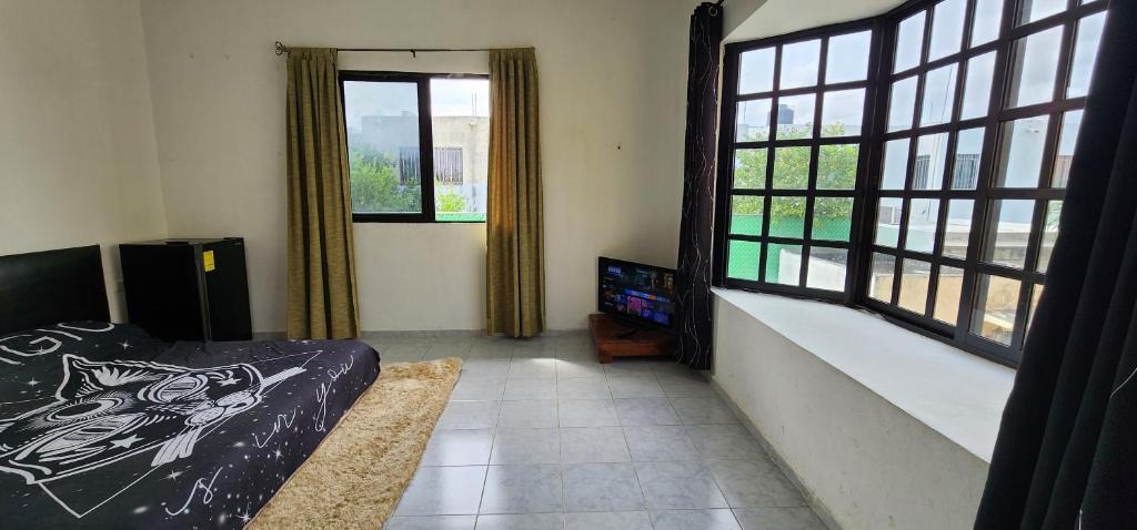 Merida House | Buda Room