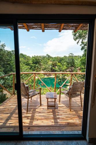 Puerto Juarez Resort | Cenote Escondido Cabañas y Camping