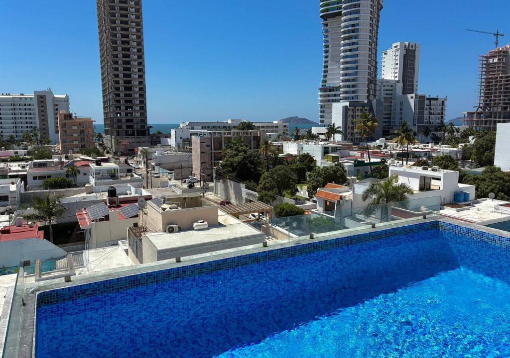 Ferrocarrilera Apartment | Cerca de la Playa con Alberca en Roof By GPSRenta