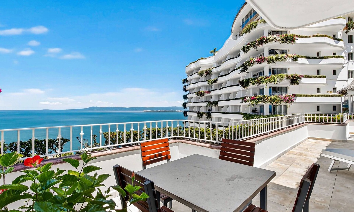 Conchas Chinas Apartment | Coastal retreat condo with resort-style pool, hot tub & oceanfront terrace