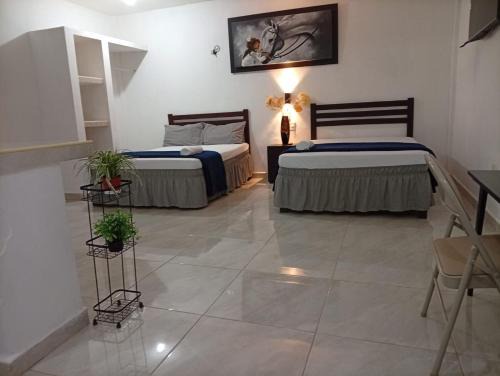 Felipe Carrillo Puerto Hotel | Habitaciones Aurelia