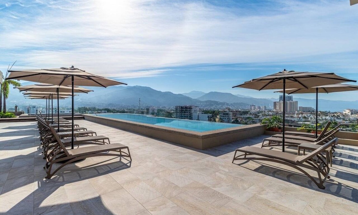 Diaz Ordaz Apartment | Modern Corner Condo in Versalles Rooftop Infinity Pool Prime Foodie Location