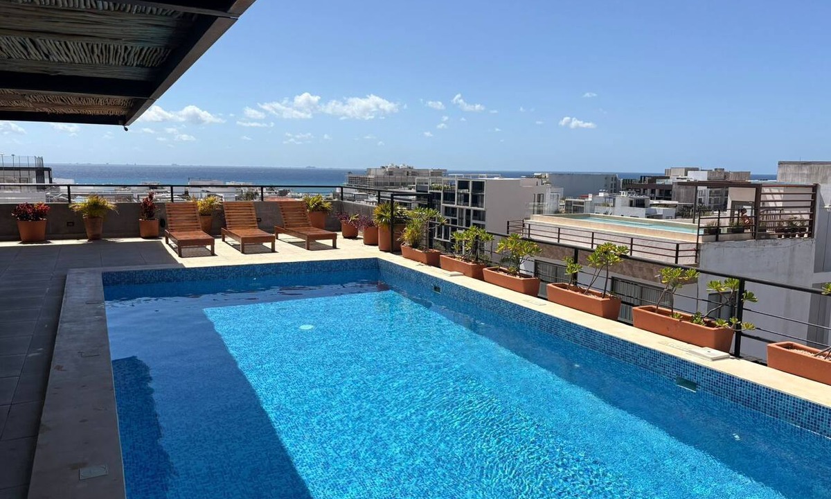 Luis Donaldo Colosio Condo | Newer spacious luxury condo steps from 5th ave, minutes walk to the beach.