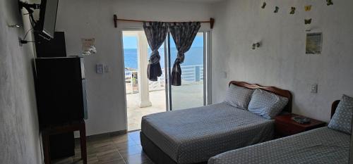 Dzilam de Bravo Hotel | Posada las palmeras