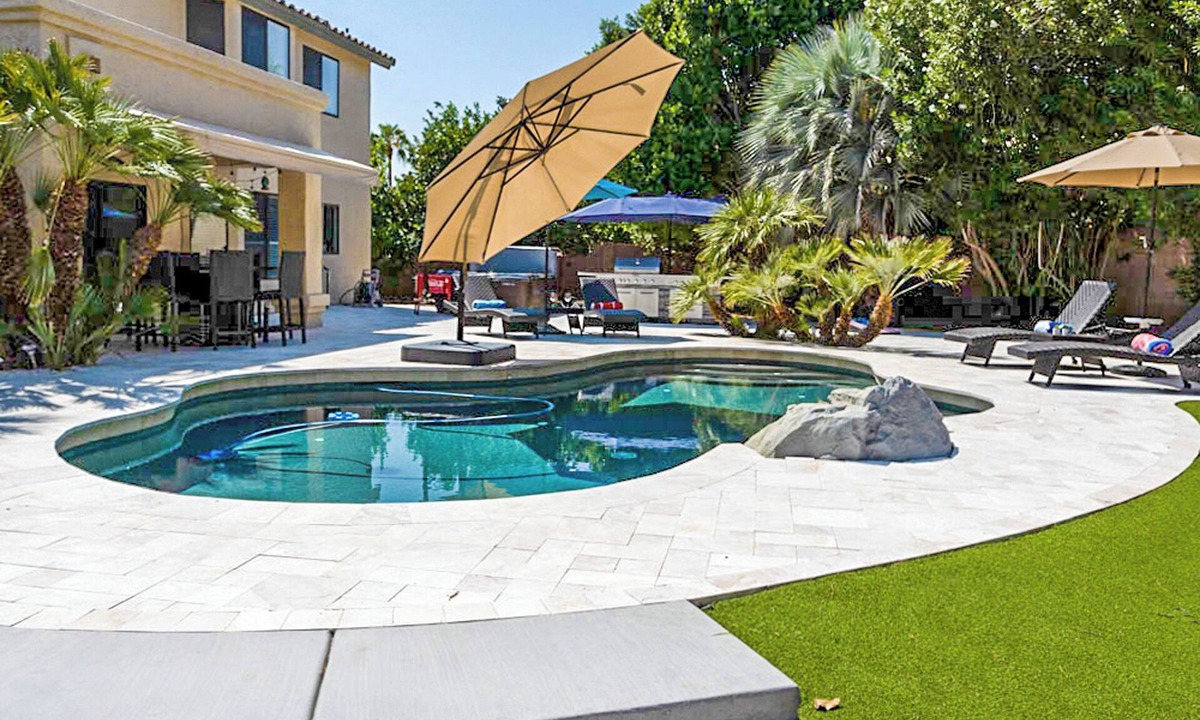 Ocotillo House | Resort Backyard with Pool, Spa & Putting Green