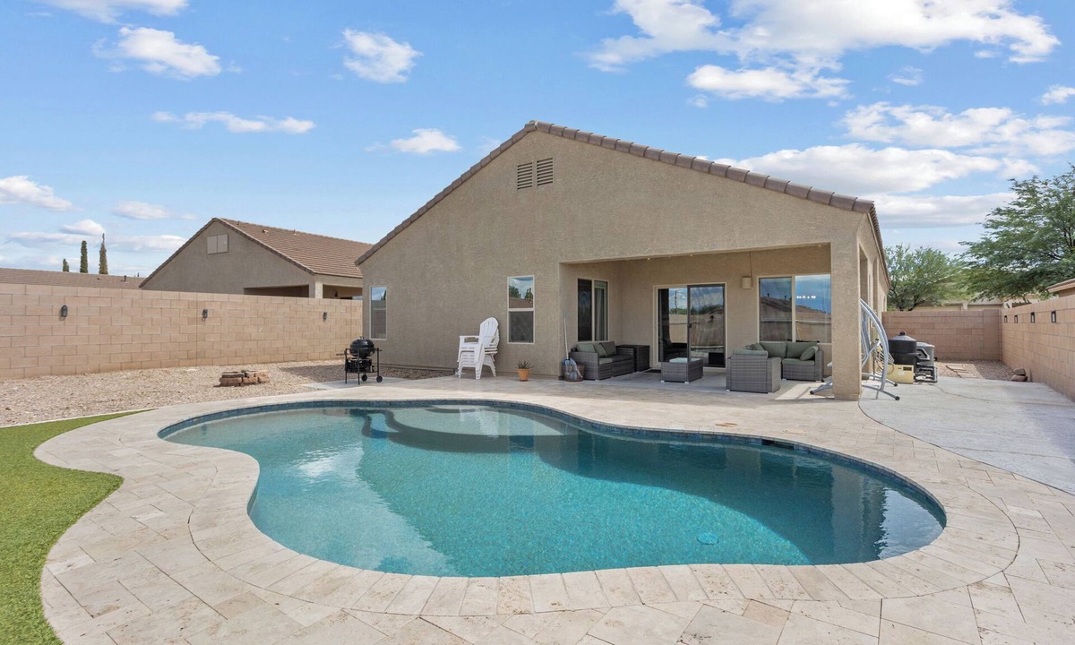 Corona de Tucson House | Secluded vibes, fireside stargazing, sparkling pool, and modern comfort.