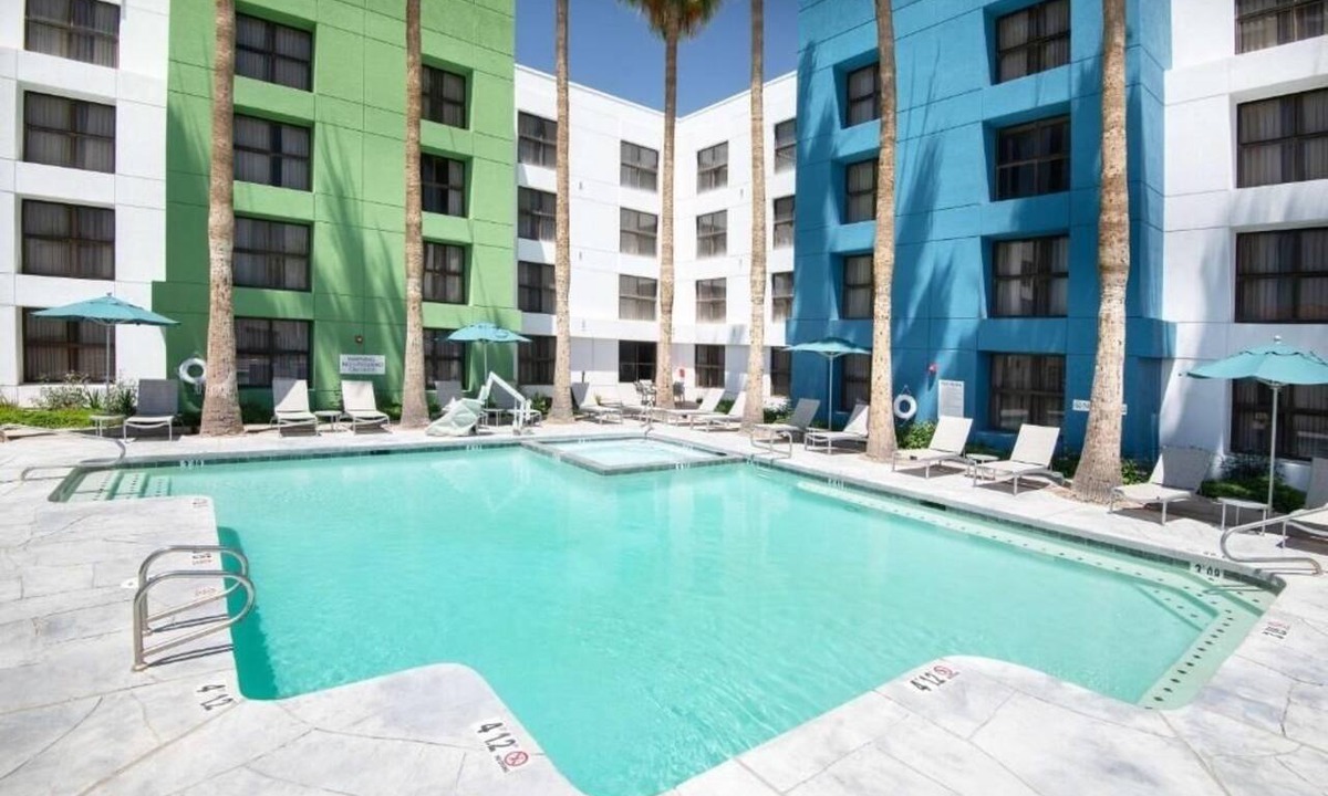 Chandler Hotel | Sustainable Comfort: Heated Pool, On-Site Dining & Easy Access to I‑10