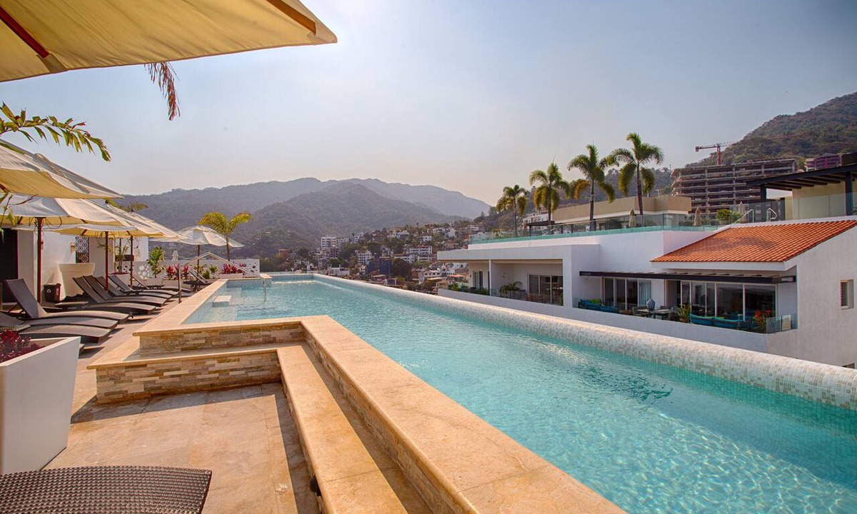 Emiliano Zapata Condo | Workspace, Mini-Bar & Rooftop Pool | 2BR Retreat