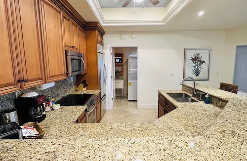 Cozumel Condo | 2 Bedroom condo 2.5 bathroom Full kitchenPool Hot tub Laundry room Gym