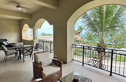 Cozumel Condo | 2 Bedroom condo 2.5 bathroom Full kitchenPool Hot tub Laundry room Gym
