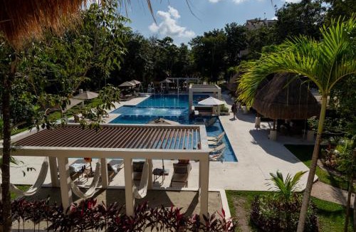 Puerto Morelos Apartment | 2 pools,long stays,peaceful complex,relax,WiFi,remote work,8mins drive to beach,casa Yellowstone