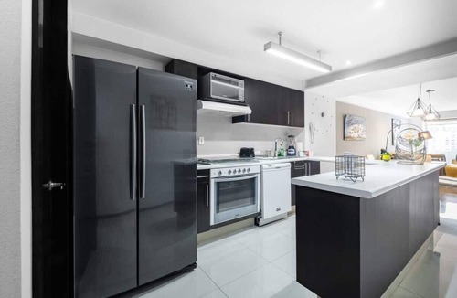 Ampliacion Granada Apartment | 2BR Luxury Stay Mundial 2026 Pool & Skyline Views