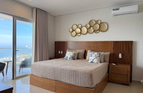 Zona Dorada Apartment | A Pie de Playa, Con Hermosas Vistas al Oceano