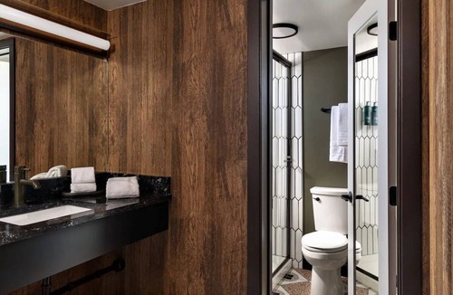Flagstaff Hotel | A Stylish Room Blending Retro Vibes and Modern Conveniences | Outdoor Pool