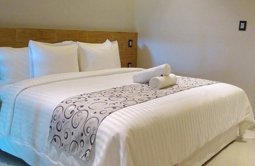 Downtown Cancun Hotel | Affordable Stay in 2 Comfortable Rooms and Easy Access to Cancún’s Best