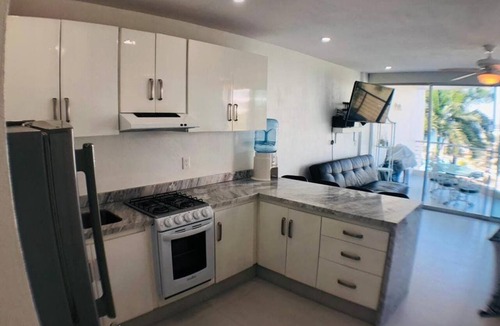 Flamingos Apartment | Area Ocean, Affordable 1BR Studio, Beachfront Resort, Pools, Snack Bar, & Balcony