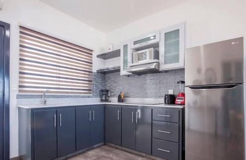 La Paz Condo | Bayview Terrace, Pools, Gym, Walk to Malecon