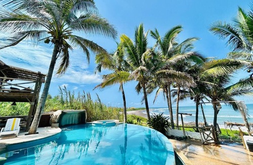 Elota Apartment | Beachfront Space with Pool By PartnerHost