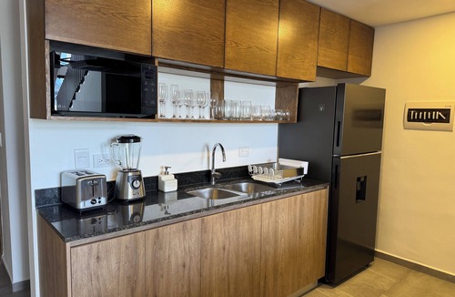Merida Municipality Apartment | Beautiful modern Loft w/Rooftop Pool, Coworking Area, Game room & Security 24/7