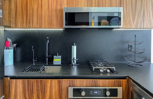 Colonia 5 de Diciembre Condo | Blissful Ocean-View Penthouse with Rooftop Pool