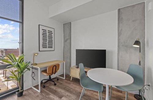 Evans Churchill Apartment | Boulevard Stays Modern Highrise STU Sky Pool Parking Gym 13