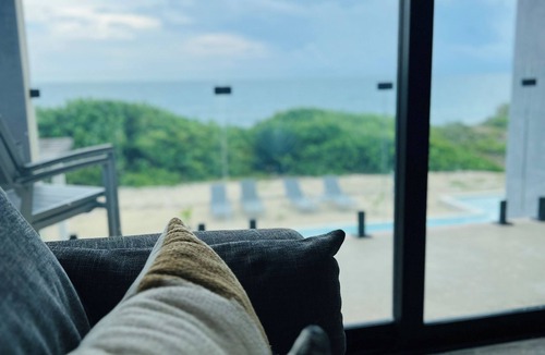 Isla Mujeres Condo | Brand new modern-bohemian, Ocean front, 2 bed, 2 bath condo. With pool.