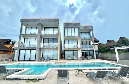 Isla Mujeres Condo | Brand new modern-bohemian, Ocean front, 2 bed, 2 bath condo. With pool.