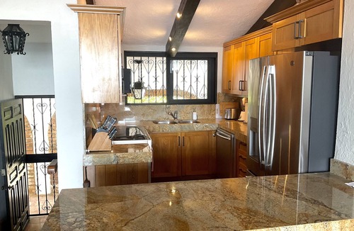 Downtown Puerto Vallarta Condo | Breezy Ocean View, 4 Blocks from the Malecon in Lush Garden Setting