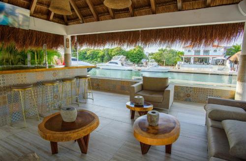 Puerto Aventuras Villa | CASA BUDA VILLA RIVIERA MAYA Puerto Aventuras MUELLE PRIVADO