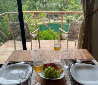 Puerto Juarez Resort | Cenote Escondido Cabañas y Camping
