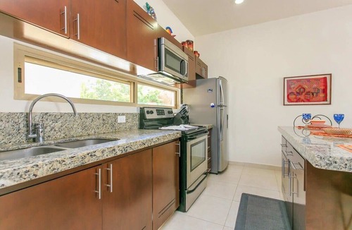 Zama Apartment | Coastal Luxe Penthouse: Rooftop Jacuzzi & Grill
