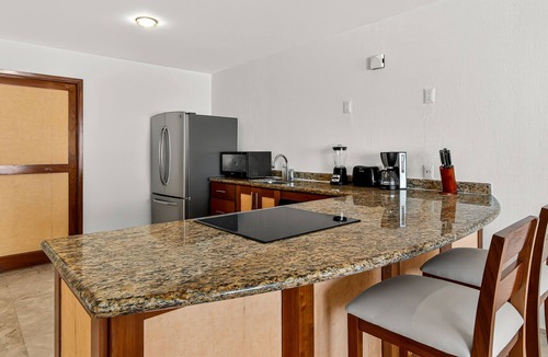 Conchas Chinas Apartment | Coastal retreat condo with resort-style pool, hot tub & oceanfront terrace