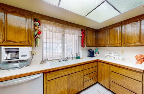 Sun City House | Comfortable stay with a pool, tennis court, and gym access, washer/dryer, & AC