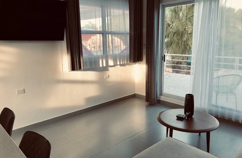 Chicxulub Puerto Condo | Cozy apartment with ocean view & pool