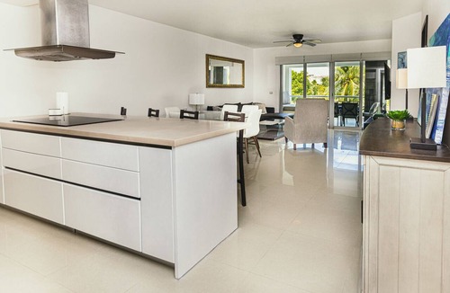 Puerto Juarez Condo | Cozy & NEW unit Steps from the Beach sleeps 6 Casa Magallon