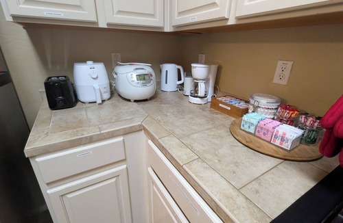 Bell West Ranch House | Cozy Surprise Desert Oasis Kitchen & 4 Bedrooms w/AC. Group & Pet-Friendly!
