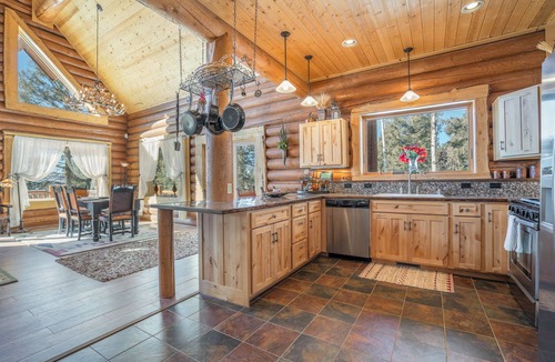 Angel Fire Ski Chalet | Custom high-end 3 bedroom log cabin sleeps 12. Located on the ski hill!