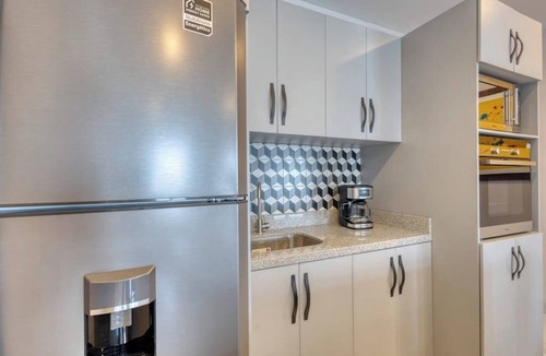 Downtown Cabo San Lucas Apartment | Dog-friendly Apartment With Rooftop Infinity Pool, Gym, Central AC & Balcony