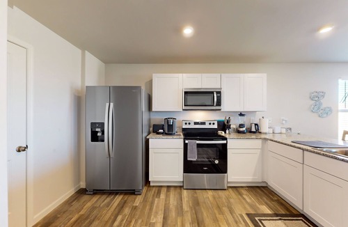 Pomerene House | Dog-friendly modern home with children's items, open-concept layout, & W/D