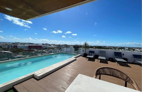 Puerto Juarez Apartment | Elegant studio in the center PlayaDelCarmen top floor with pool and nice view