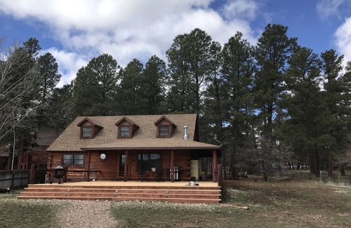 Pinetop-Lakeside Cabin | Family Friendly Lakefront Cedar Log Cabin on 2 acres at Rainbow Lake.