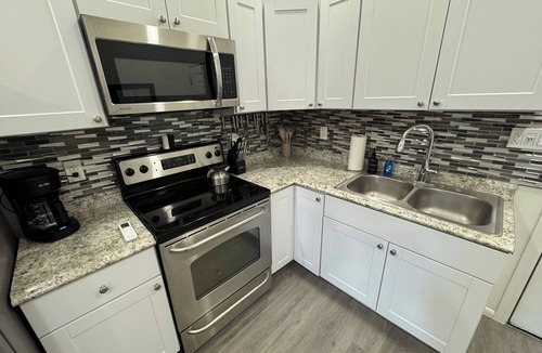 Globe Apartment | Historic King Suite in Upton's Confectionery