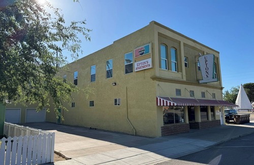 Globe Apartment | Historic King Suite in Upton's Confectionery