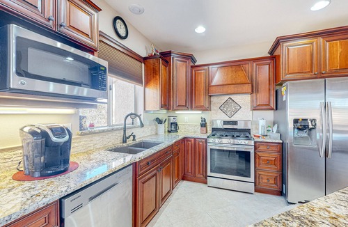 Sun City West House | Inviting home with full kitchen, patio, central AC, & W/D