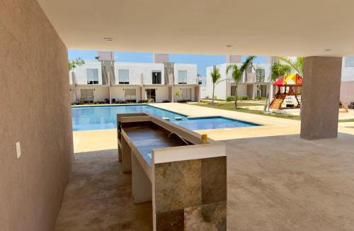 Puerto Juarez Villa | Linda casa frente a alberca en Playa del Carmen