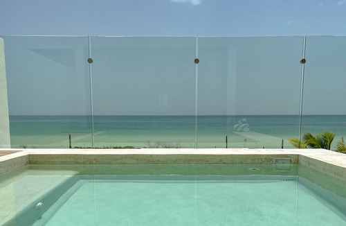 Dzemul Apartment | Luxury Condo Ocean Front - Family Friendly