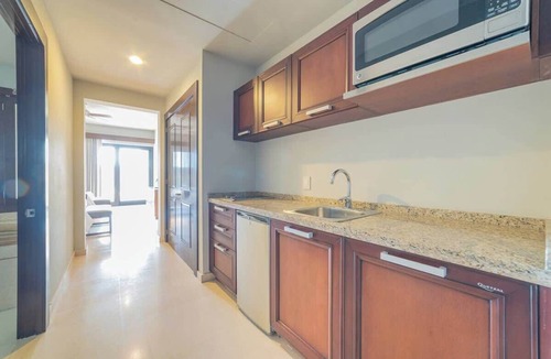 La Paz Condo | Marina View Suite · Beach Club · Housekeeping
